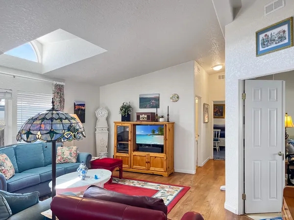 a living room with furniture and a couch