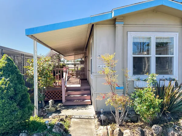 a front view of a house with a porch