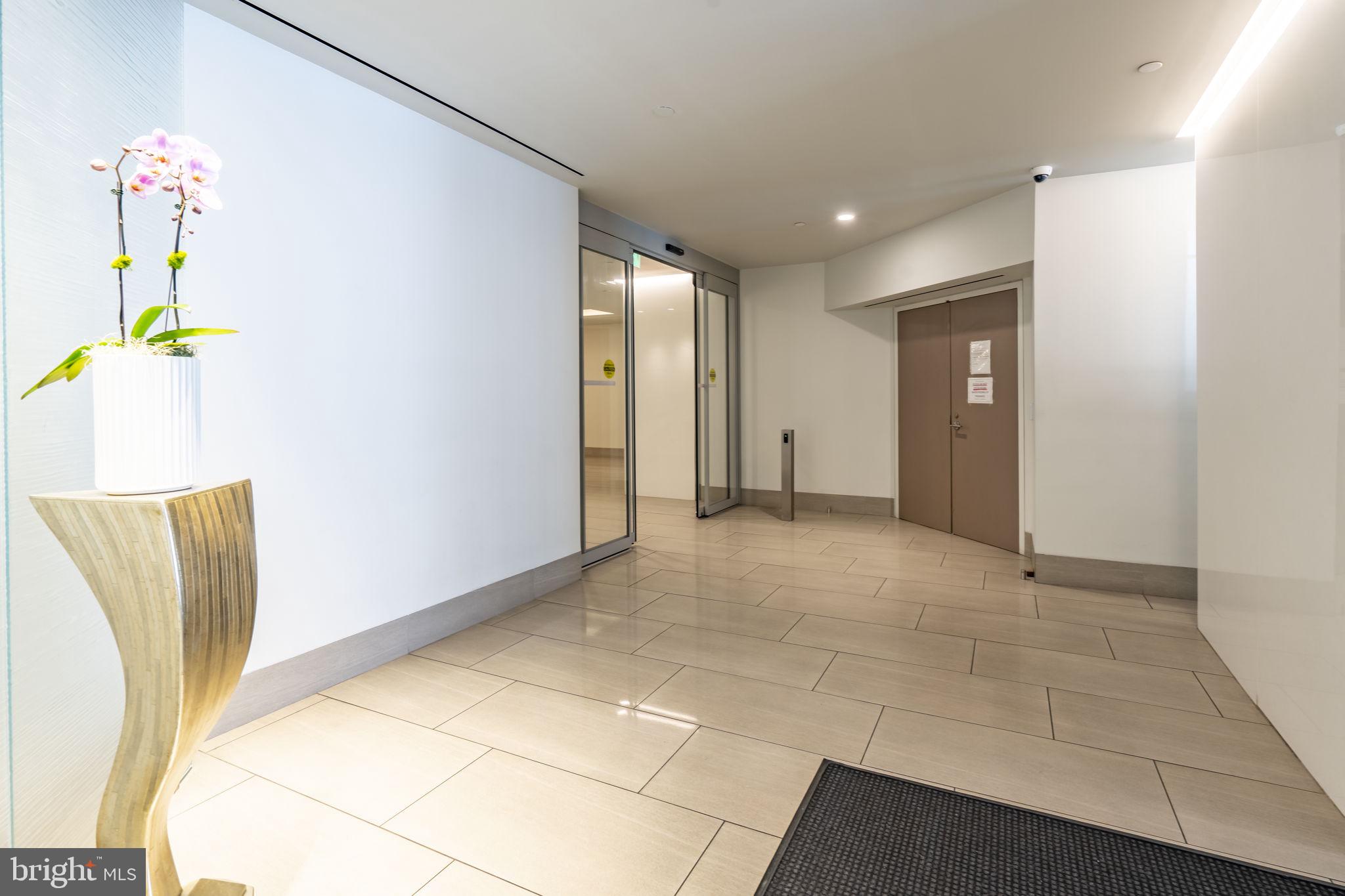 2020 Walnut Street, Unit 29K Philadelphia, PA 19103 - Photo 16 of 20 a view of an entryway with wooden floor