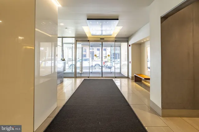 a view of a hallway with windows