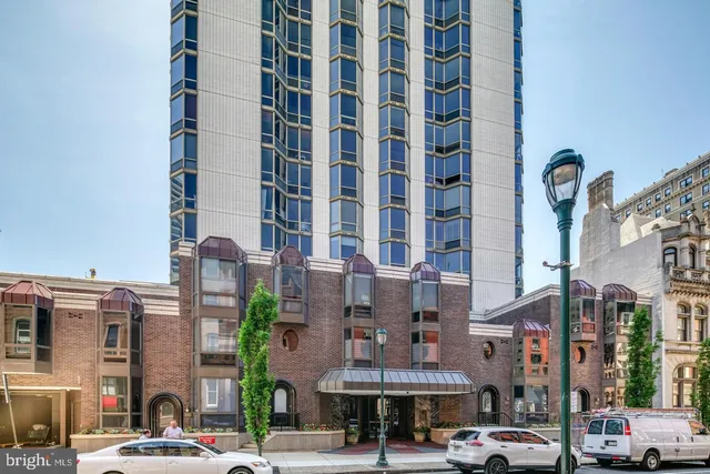 a front view of a building with street view