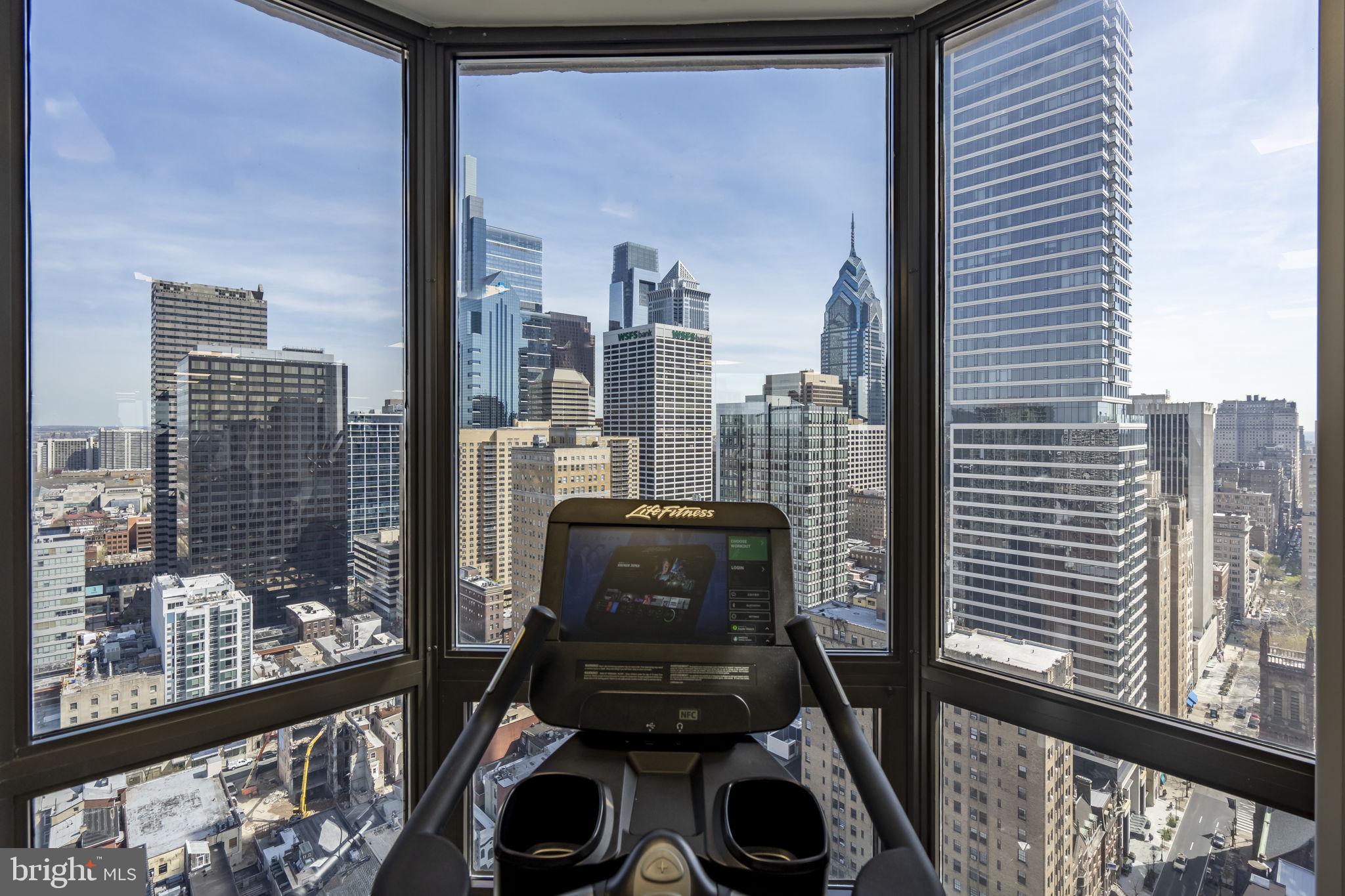 2020 Walnut Street, Unit 29K Philadelphia, PA 19103 - Photo 7 of 20 a view of a balcony with chairs and a gate