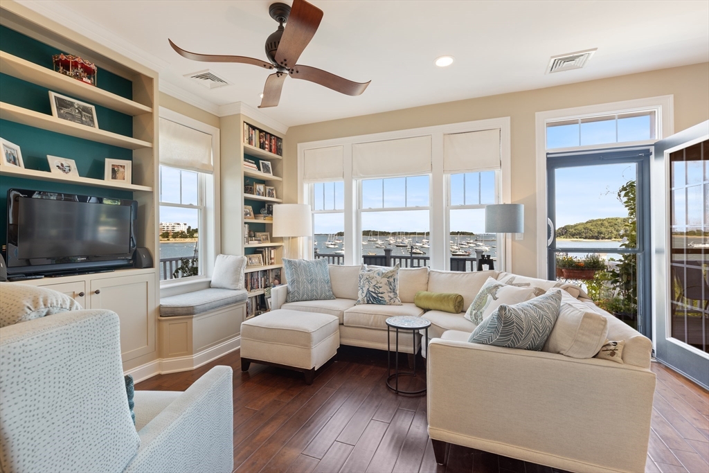 151 HMS Halsted Drive, Unit 151 Hingham, MA 02043 - Photo 13 of 41 a living room with furniture and a flat screen tv