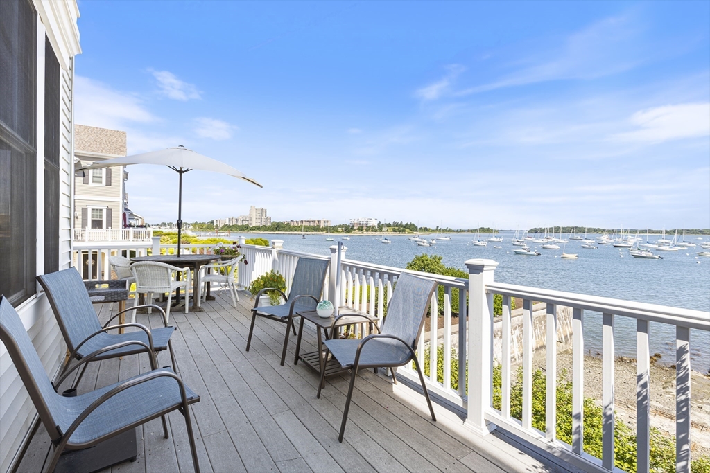 151 HMS Halsted Drive, Unit 151 Hingham, MA 02043 - Photo 16 of 41 a view of a balcony with chairs