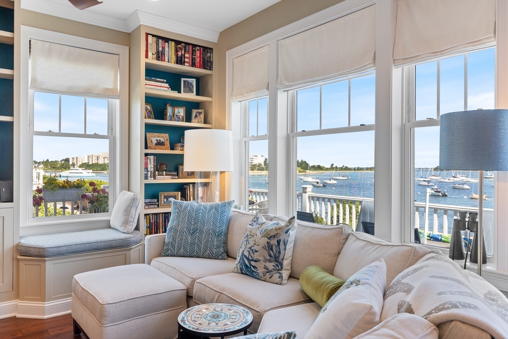 151 HMS Halsted Drive, Unit 151 Hingham, MA 02043 - Photo 2 of 41 a living room with furniture and a large window