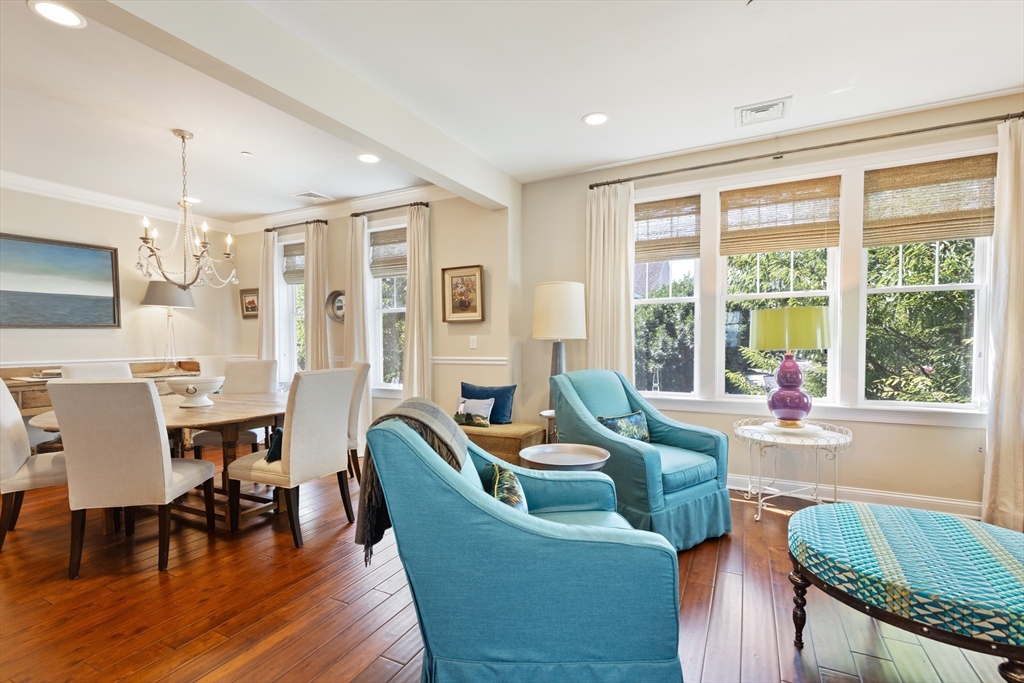 151 HMS Halsted Drive, Unit 151 Hingham, MA 02043 - Photo 26 of 41 a living room with furniture and a large window