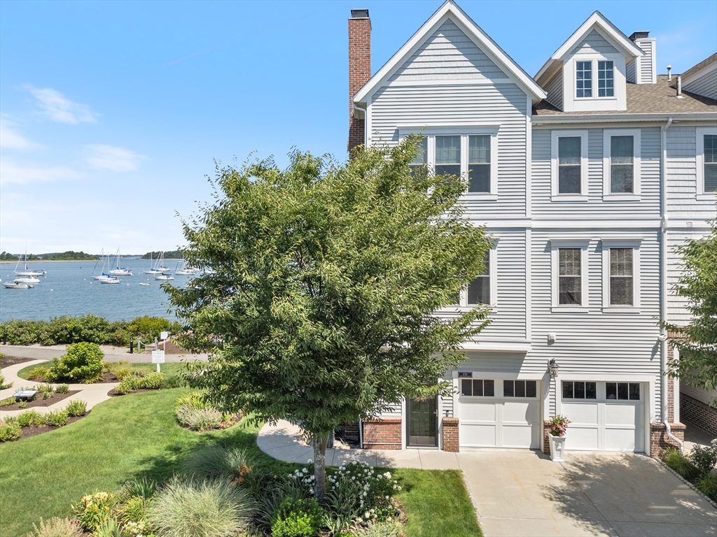 151 HMS Halsted Drive, Unit 151 Hingham, MA 02043 - Photo 29 of 41 a front view of a house with a yard
