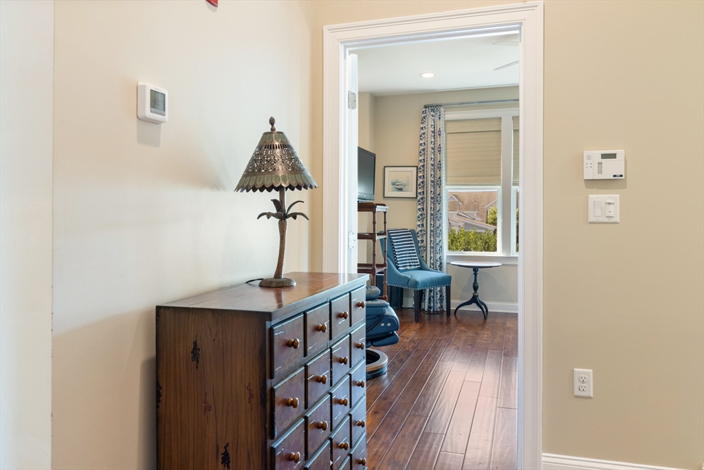 151 HMS Halsted Drive, Unit 151 Hingham, MA 02043 - Photo 33 of 41 a view of a livingroom with furniture and wooden floor