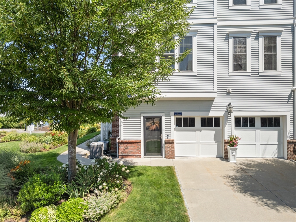 151 HMS Halsted Drive, Unit 151 Hingham, MA 02043 - Photo 37 of 41 a view of a house with backyard and a tree