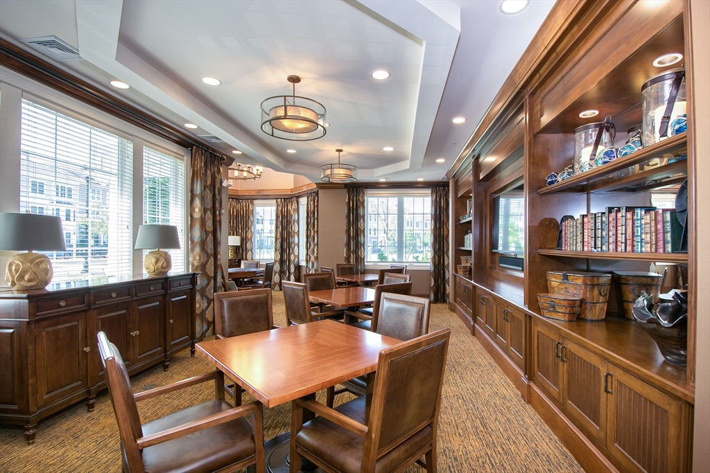 151 HMS Halsted Drive, Unit 151 Hingham, MA 02043 - Photo 39 of 41 a view of a dining room with furniture window and wooden floor