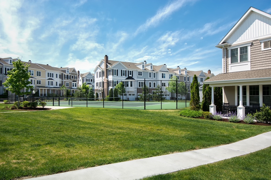 151 HMS Halsted Drive, Unit 151 Hingham, MA 02043 - Photo 41 of 41 a front view of a house with a yard