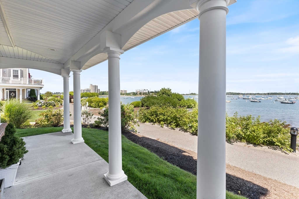 151 HMS Halsted Drive, Unit 151 Hingham, MA 02043 - Photo 7 of 41 a view of a porch with furniture and garden