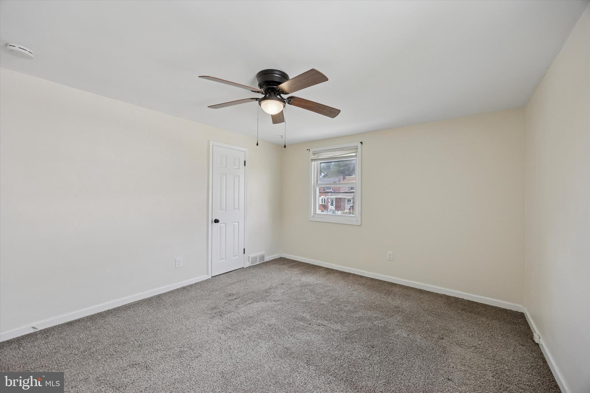 723 Bennington Road Folcroft, PA 19032 - Photo 19 of 25 a view of room with a ceiling fan and window