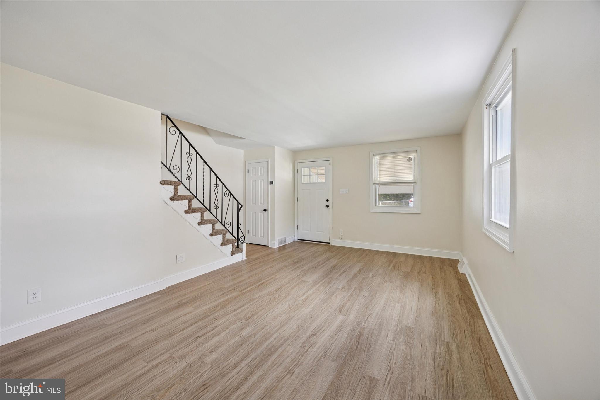 723 Bennington Road Folcroft, PA 19032 - Photo 6 of 25 a view of room with window and hardwood floor