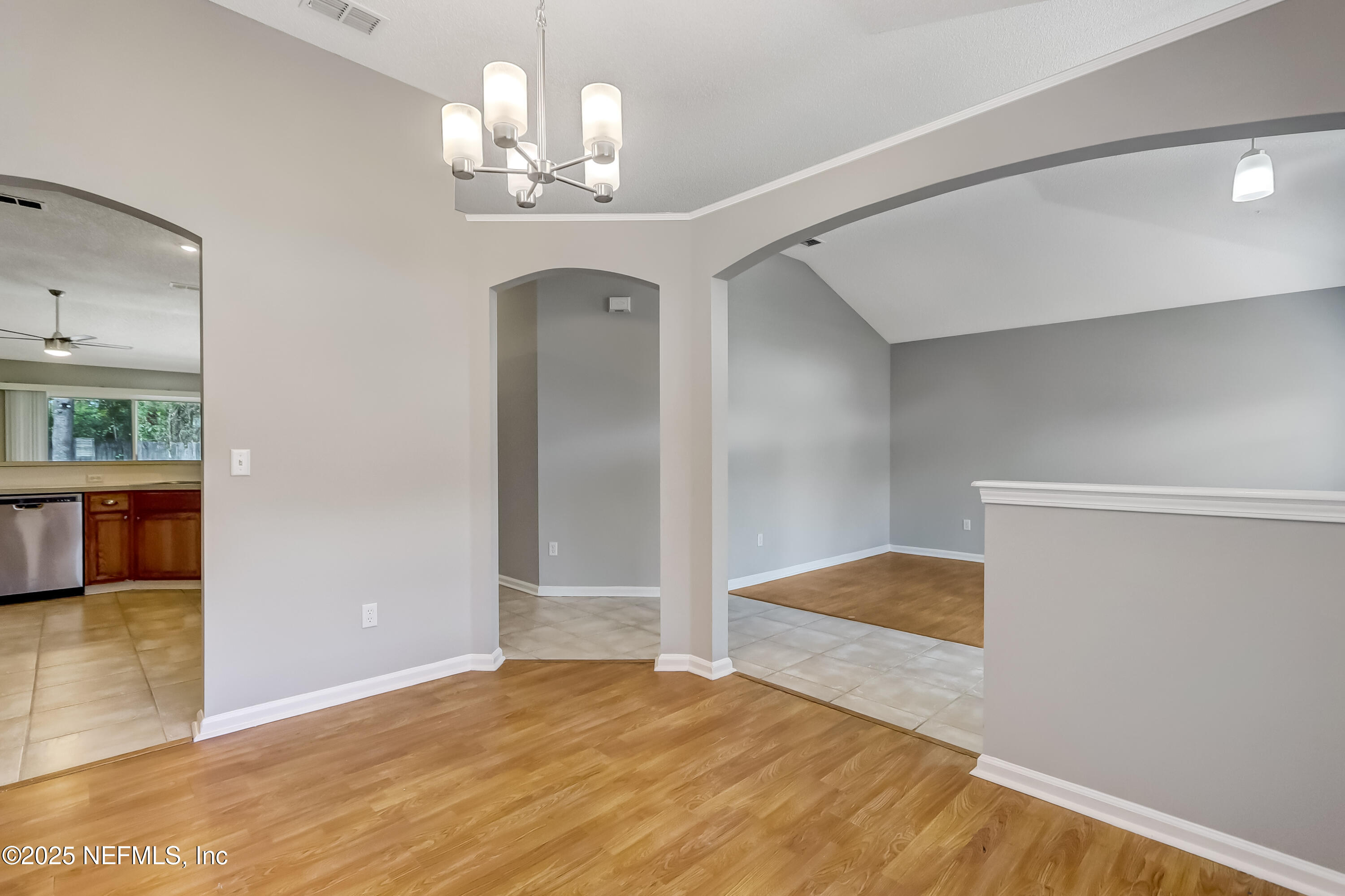 9642 Pritmore Road East Jacksonville, FL 32257 - Photo 22 of 47 a view of empty room with wooden floor