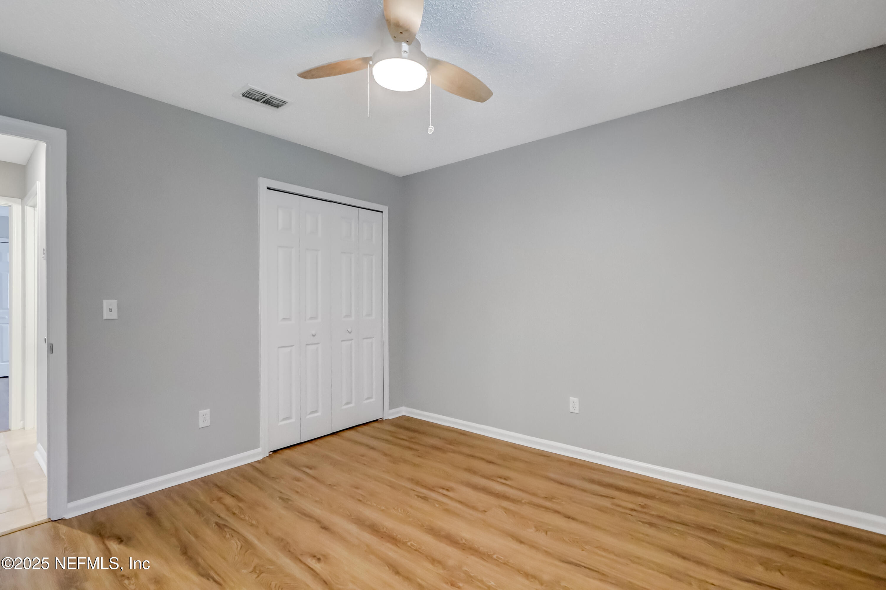 9642 Pritmore Road East Jacksonville, FL 32257 - Photo 38 of 47 wooden floor in an empty room