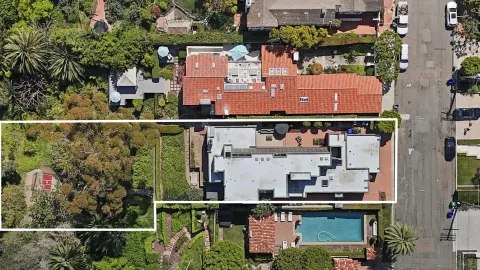 a kitchen with stainless steel appliances a sink and a refrigerator