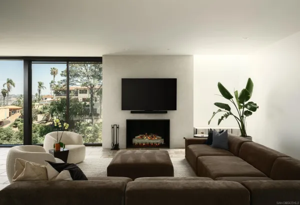 a dining room with furniture and window