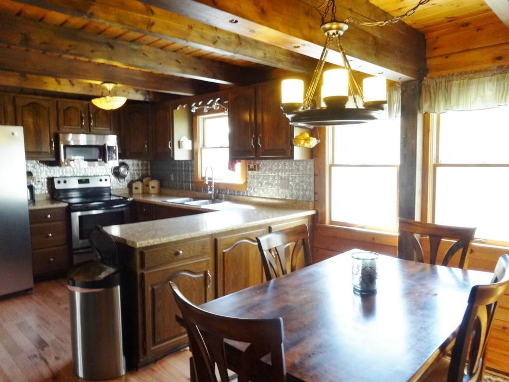 82 Airport Road Winterport, ME 04496 - Photo 12 of 35 Notice the tin backsplash and...