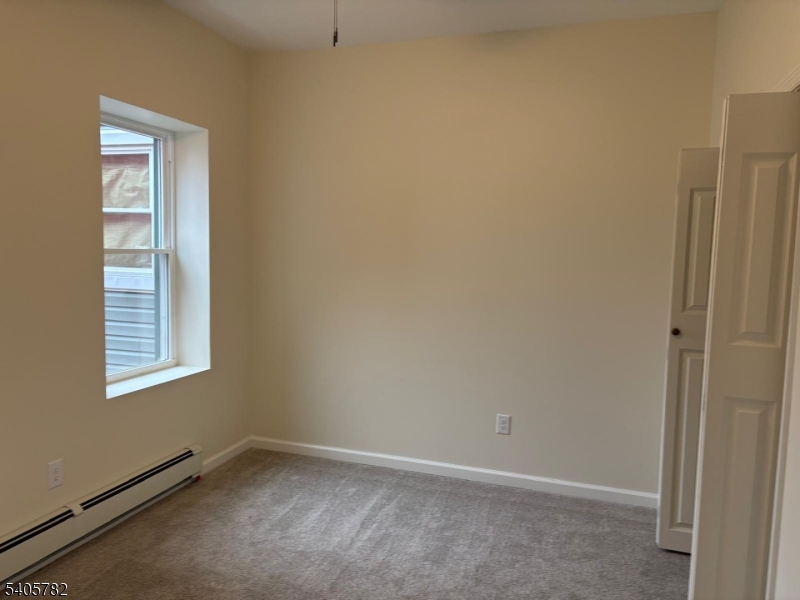 786 South Main Street, Unit 1 Phillipsburg, NJ 08865 - Photo 13 of 18 an empty room with windows