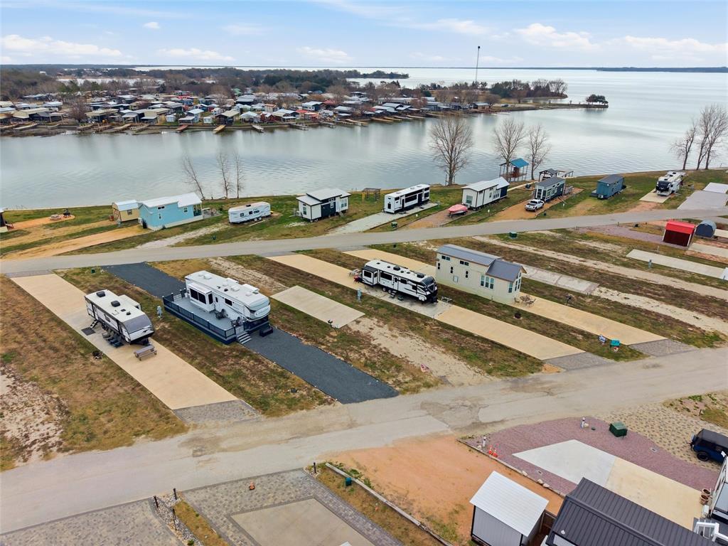 6384 Peninsula Road Kerens, TX 75144 - Photo 12 of 14 a view of a lake with houses