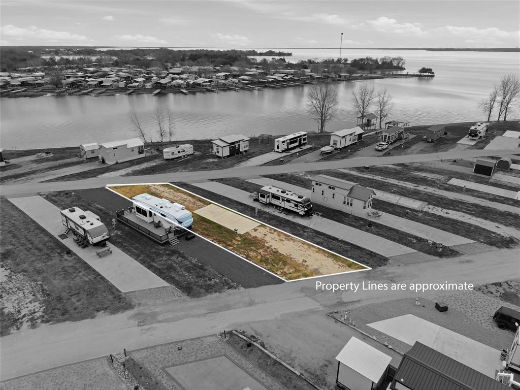 6384 Peninsula Road Kerens, TX 75144 - Photo 13 of 14 a view of a lake with houses