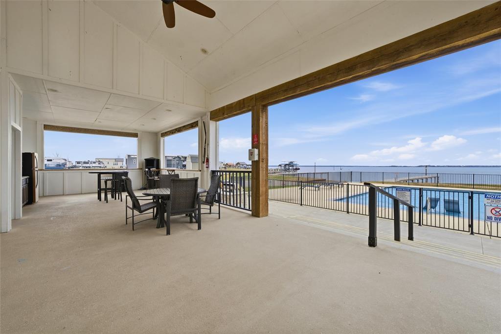 6384 Peninsula Road Kerens, TX 75144 - Photo 6 of 14 a view of a patio with a table and chairs