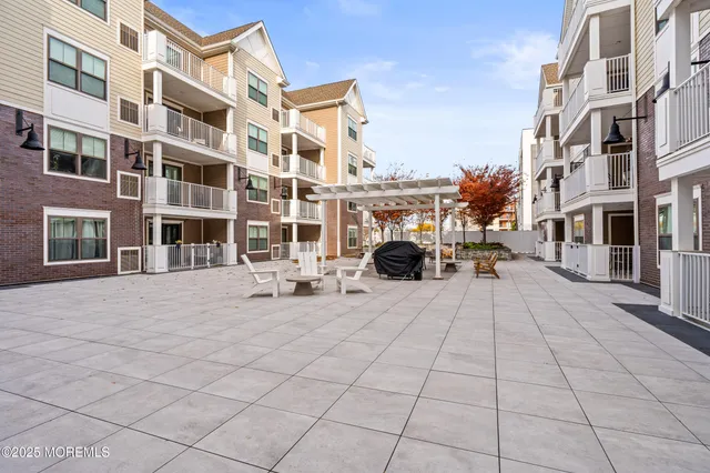 a building outdoor space with a car parked