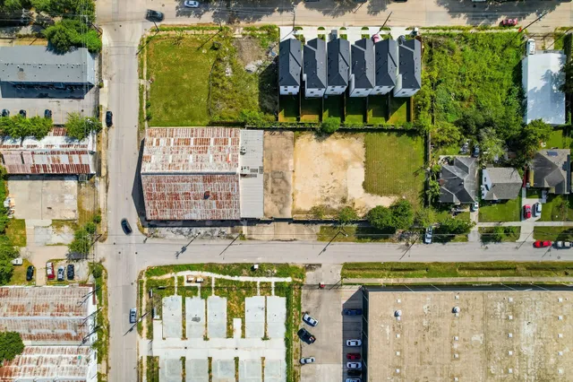 a view of a street with cars