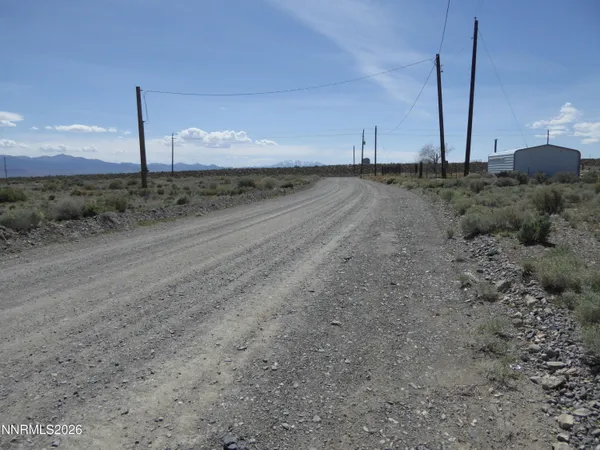 a view of a road with an ocean view