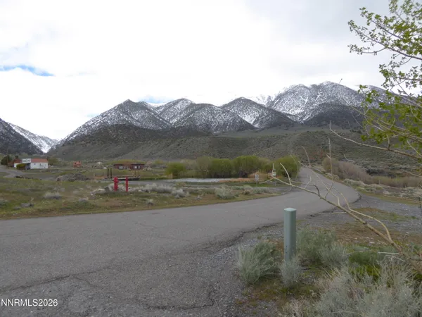 a view of mountain view with mountains in the background