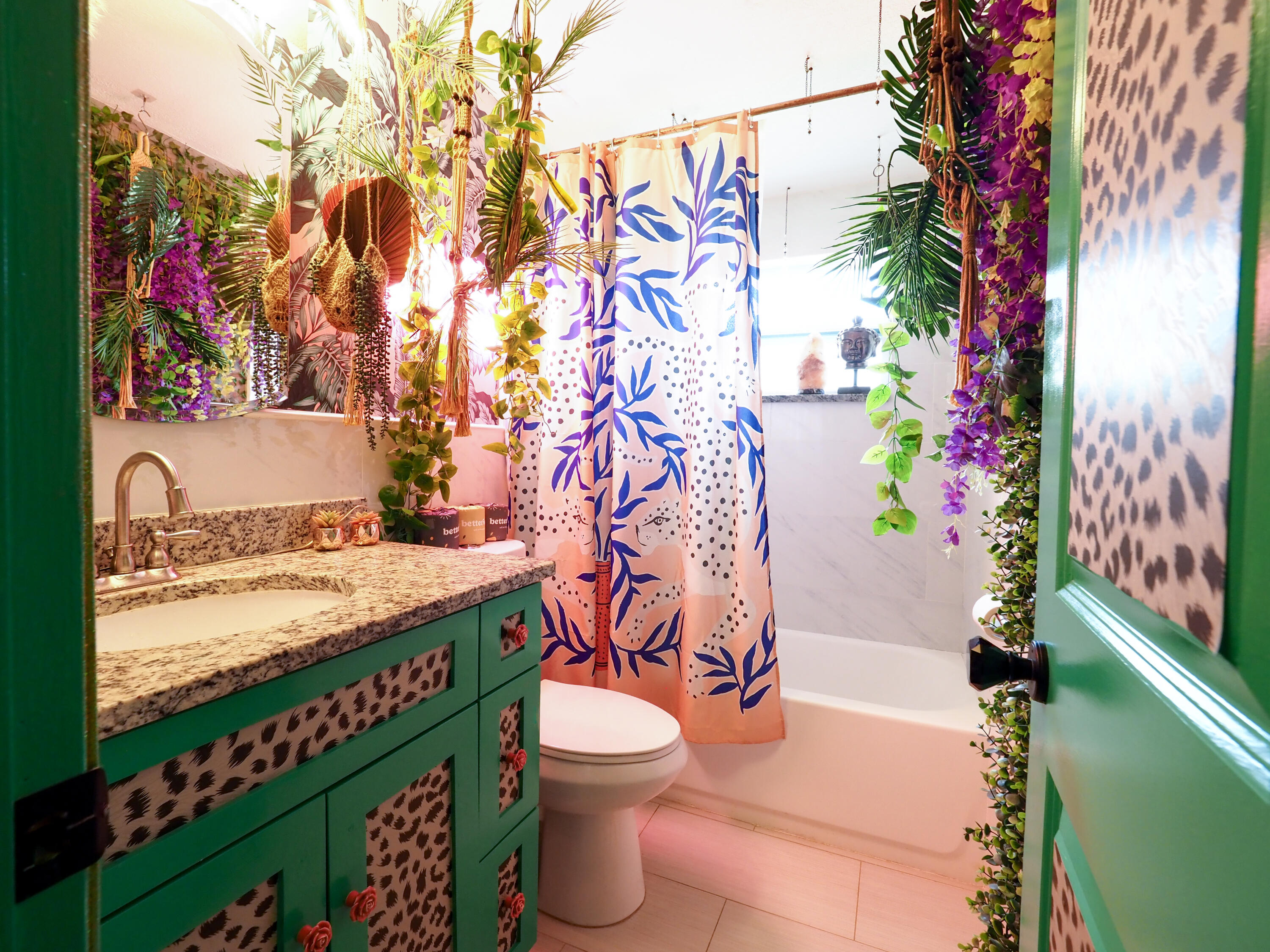 3664 Gull Road Palm Beach Gardens, FL 33410 - Photo 16 of 30 a bathroom with a toilet sink and garden view