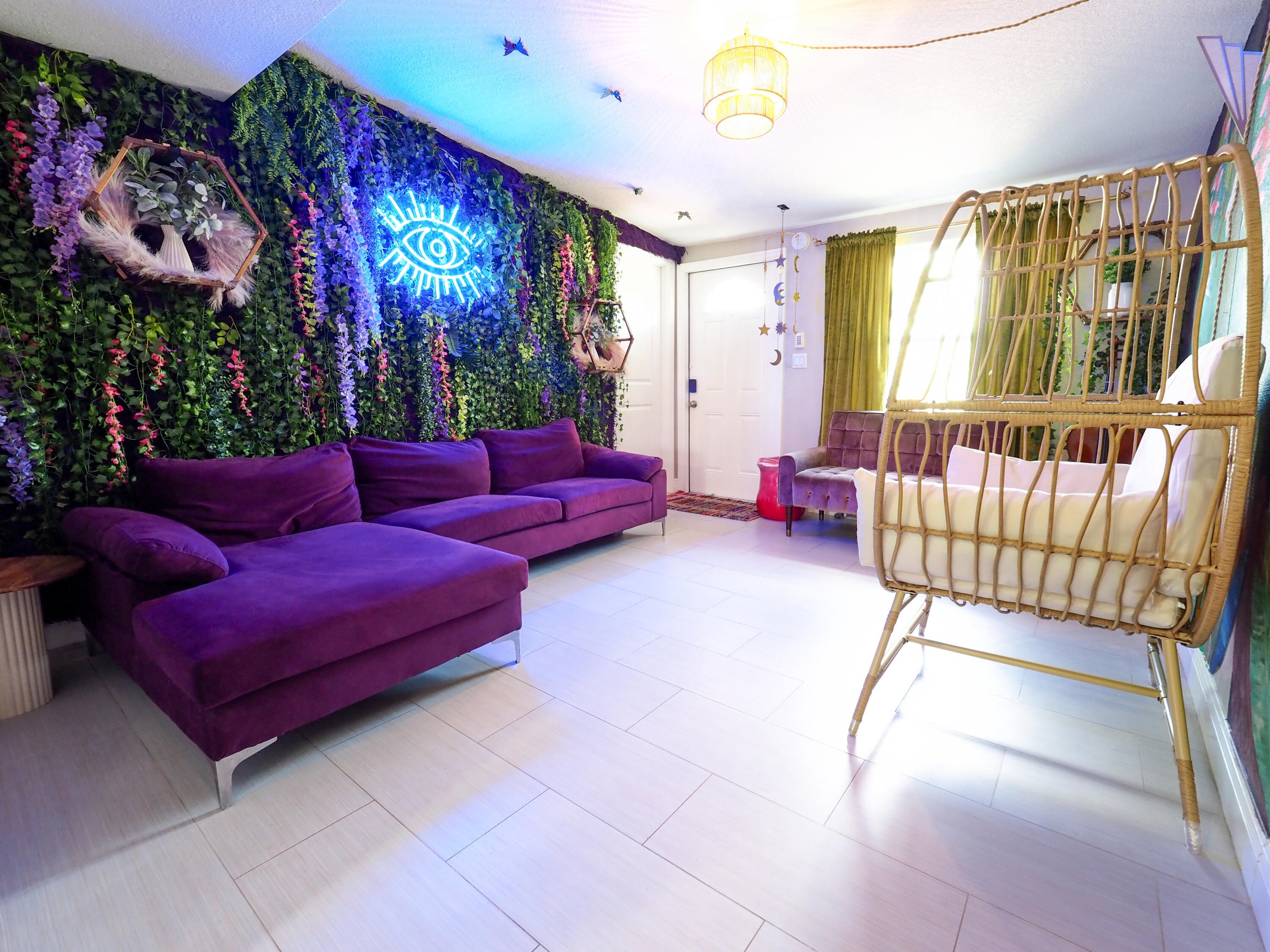 3664 Gull Road Palm Beach Gardens, FL 33410 - Photo 2 of 30 a living room with furniture and a flat screen tv