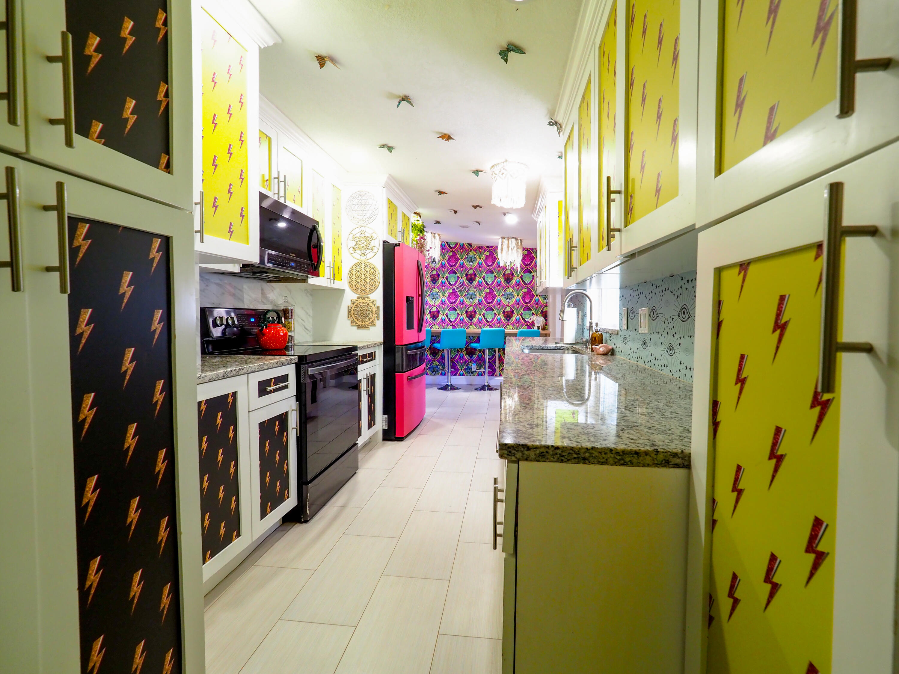 3664 Gull Road Palm Beach Gardens, FL 33410 - Photo 9 of 30 a bathroom with a sink and mirror