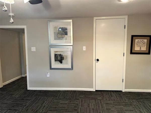 a view of a livingroom with wooden floor