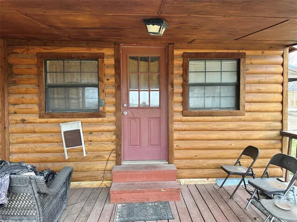 a view of a house with a lounge chair