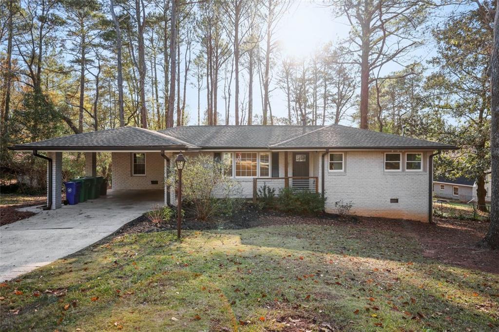 3295 Kilarney Court Decatur, GA 30032 - Photo 1 of 1 a view of a house with a yard and sitting area