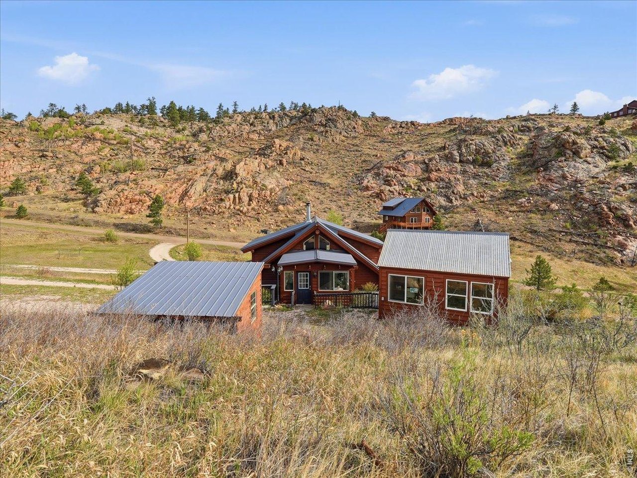 1652 Eiger Road Livermore, CO 80536 - Photo 45 of 50 Sunlit Hobby House and Wood Shed for Storage