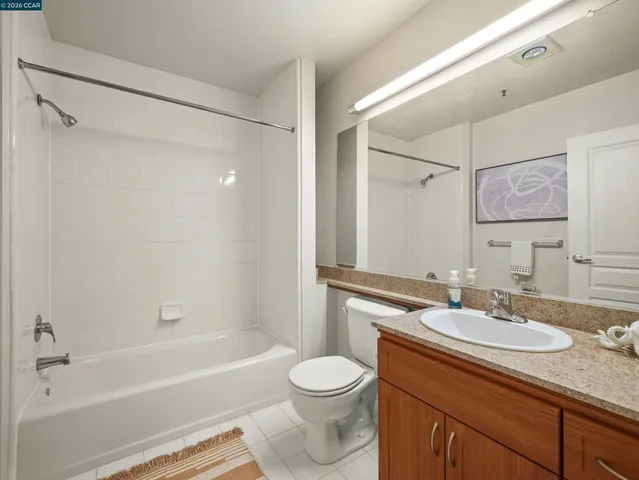 a bathroom with a sink a toilet and a bathtub