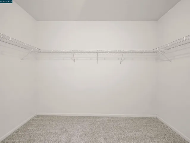 a view of a room with shelf in it