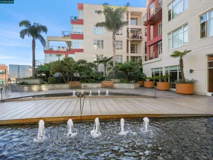 a view of a swimming pool with a lounge chairs