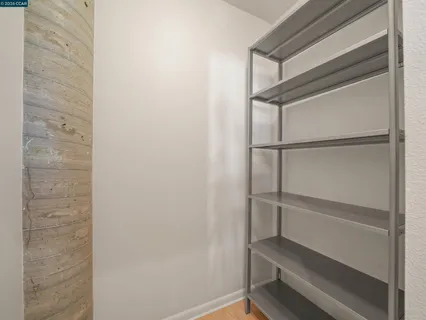a empty closet with white paint