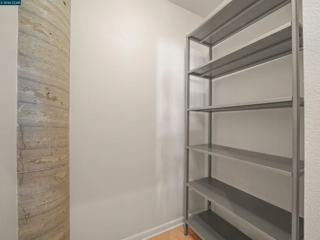 a empty closet with white paint