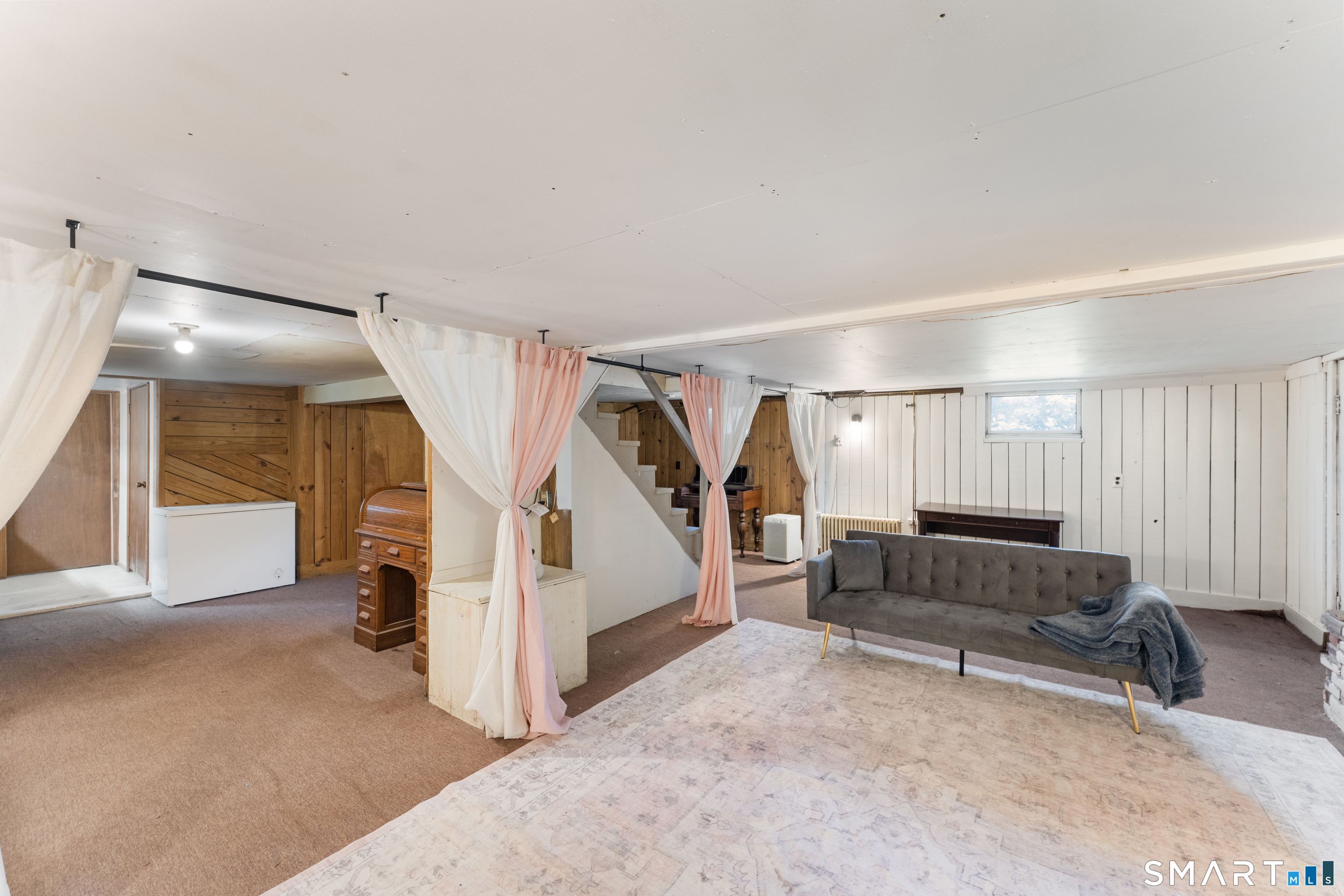 273 Hartford Road Brooklyn, CT 06234 - Photo 19 of 24 Partially finished lower level with plenty of room for storage, laundry and endless possibilities to make the space your own.