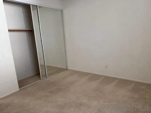 an empty room with a door
