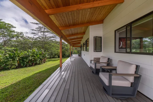 a view of house with backyard patio outdoor seating