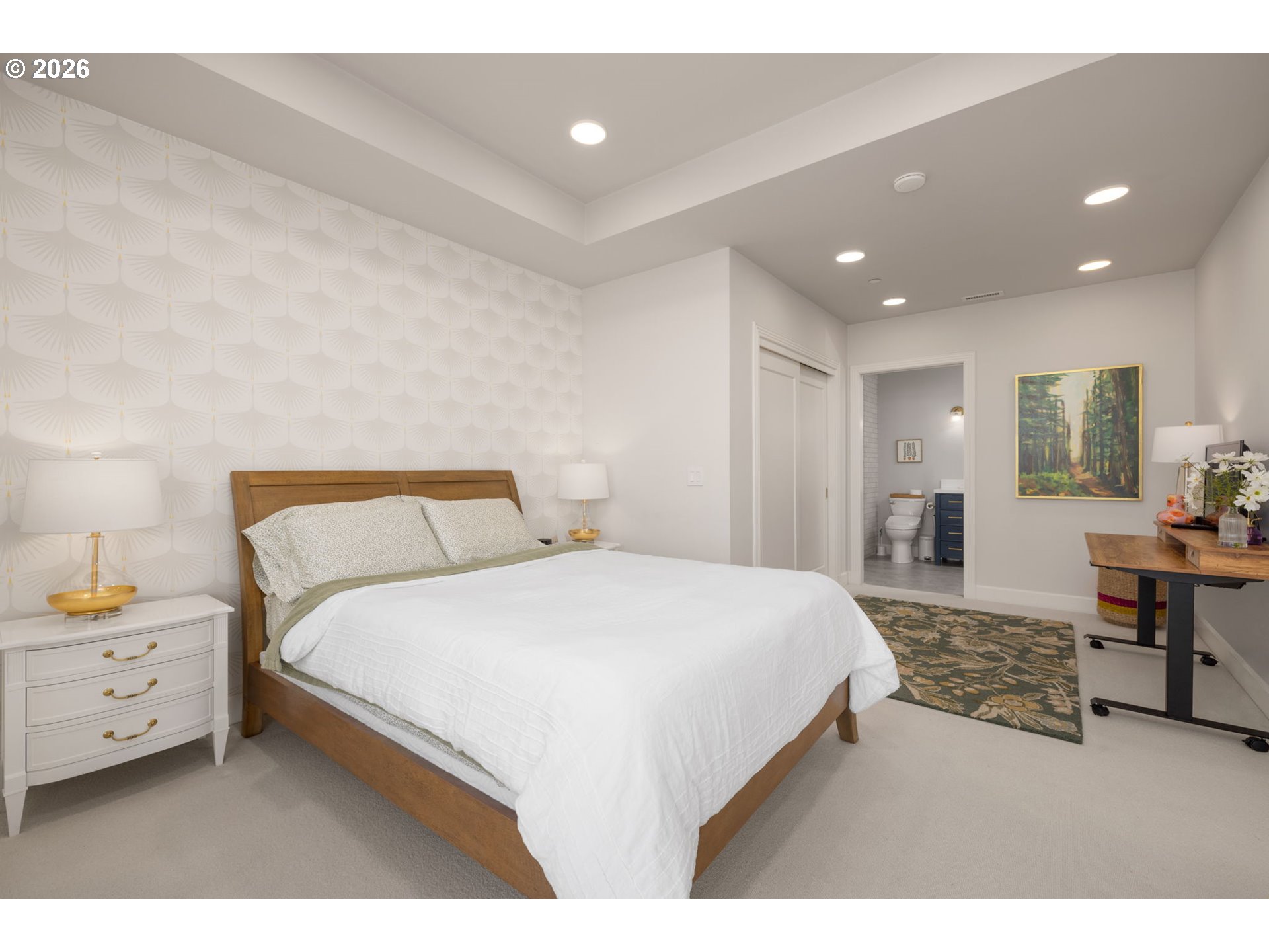 2020 Southwest Market St Drive, Unit 303 Portland, OR 97201 - Photo 20 of 31 a spacious bedroom with a bed and a desk
