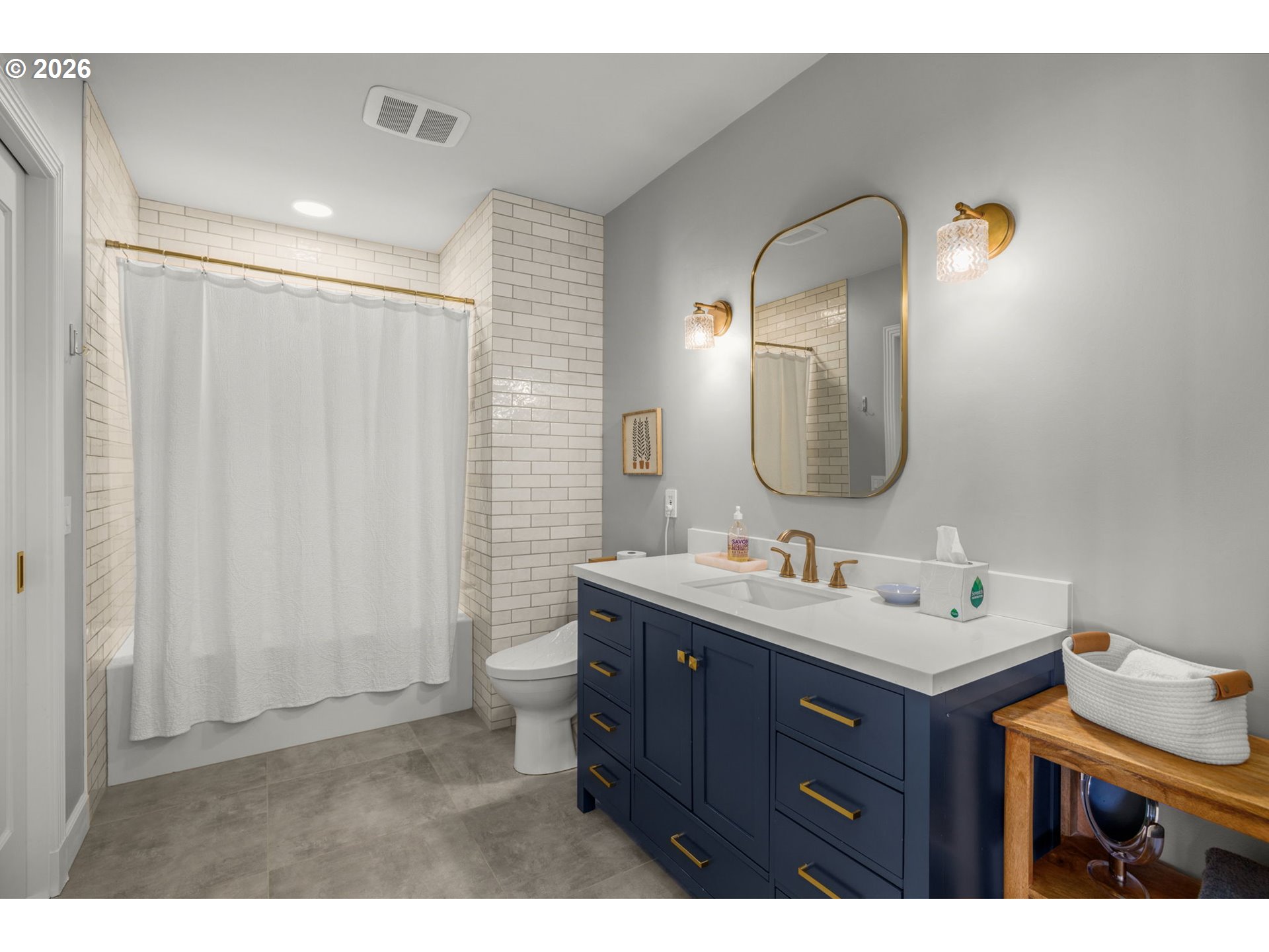 2020 Southwest Market St Drive, Unit 303 Portland, OR 97201 - Photo 26 of 31 a bathroom with a sink and a mirror