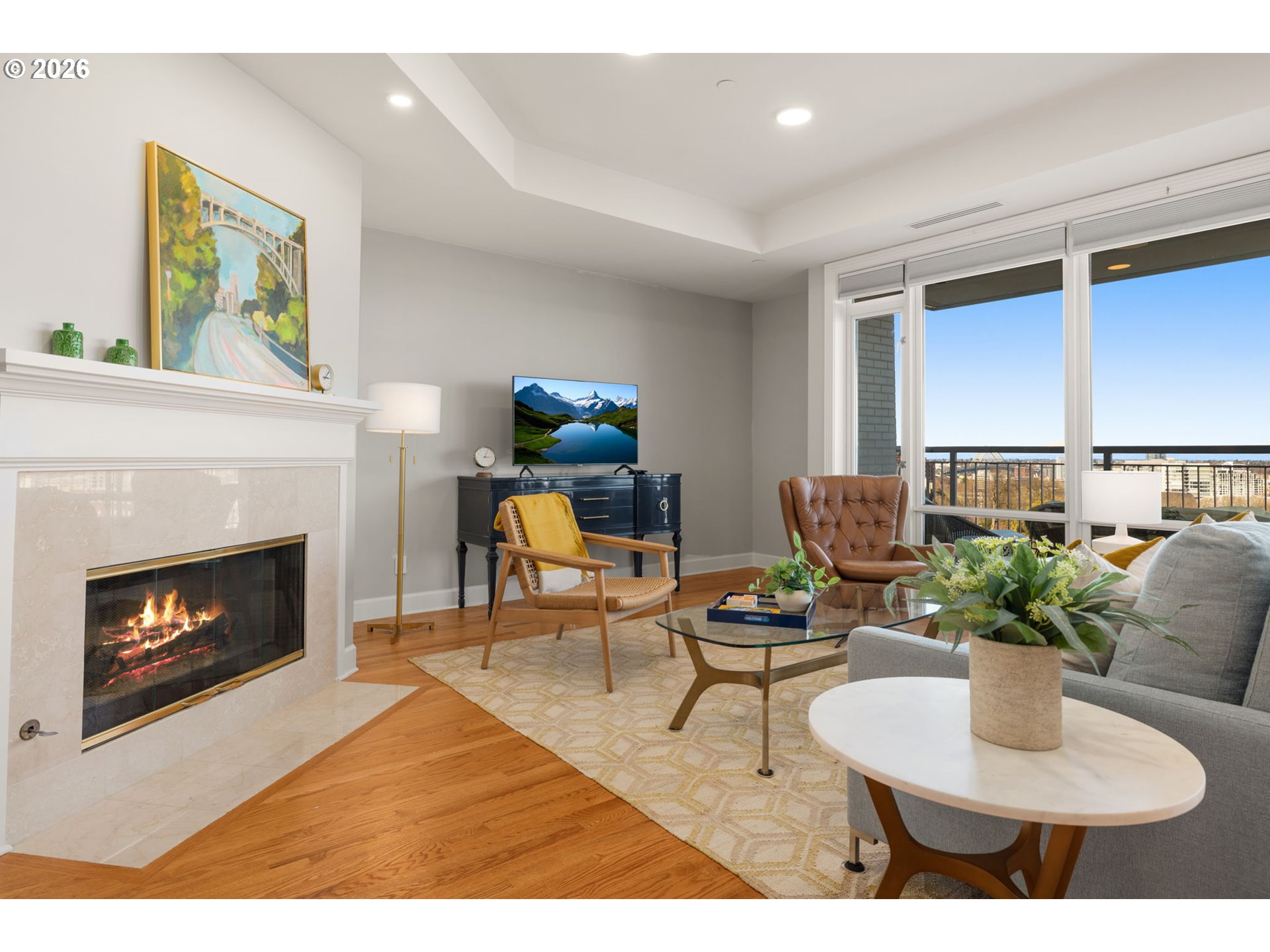 2020 Southwest Market St Drive, Unit 303 Portland, OR 97201 - Photo 10 of 31 a living room with furniture and a fireplace