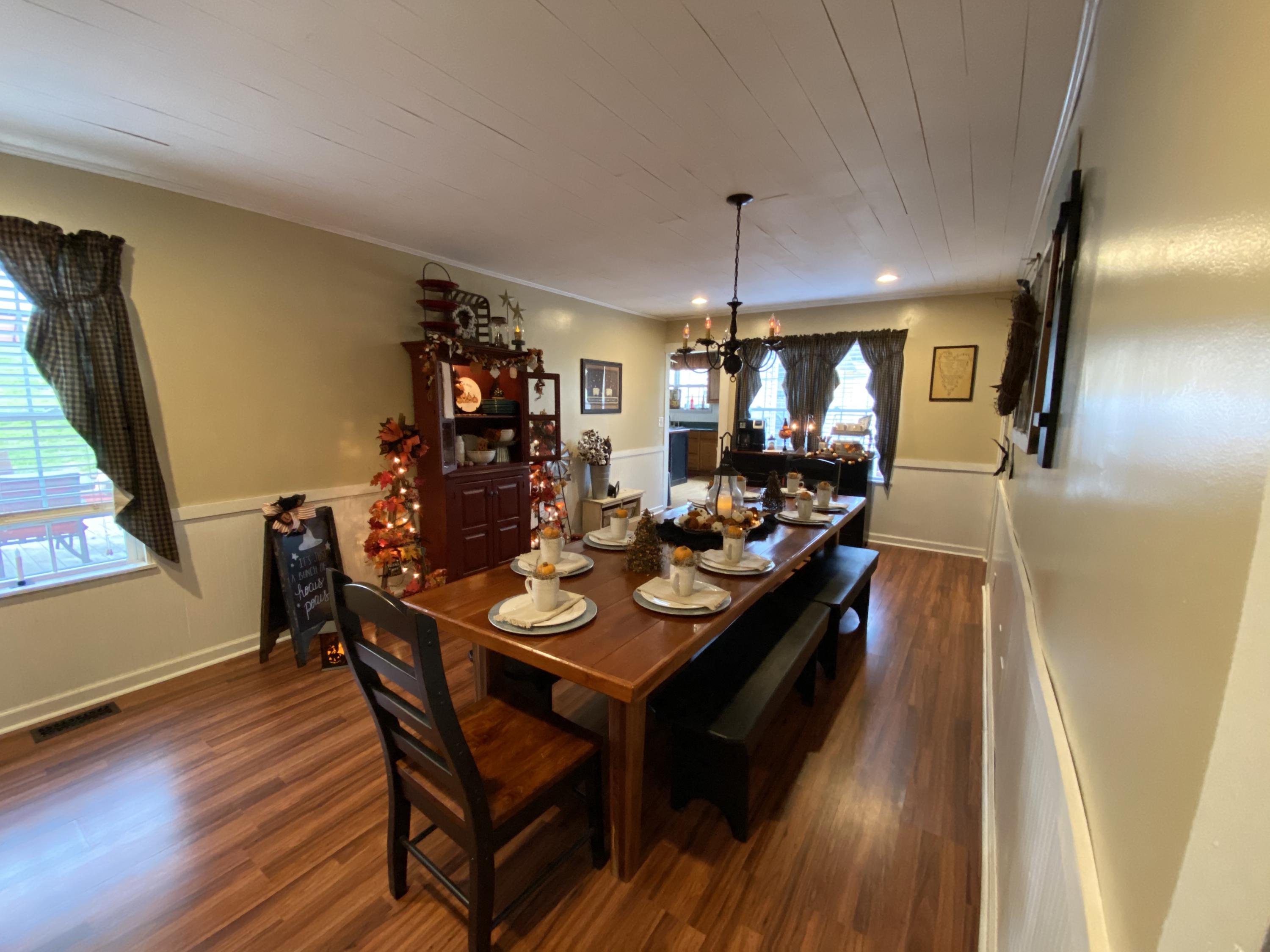2211 Riner Road Christiansburg, VA 24073 - Photo 5 of 15 a view of a dining room with furniture and wooden floor